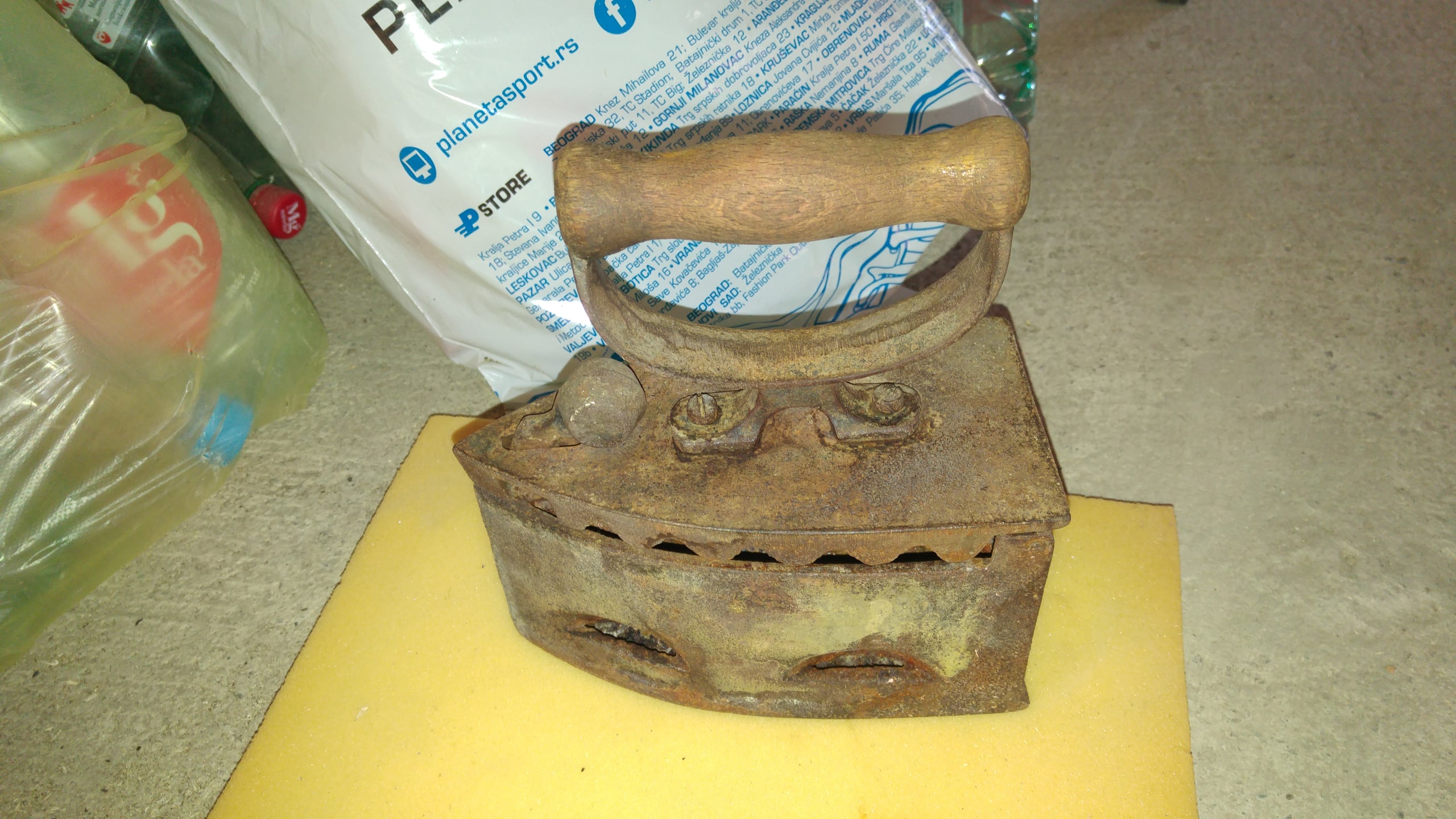 Rusty antique charcoal iron before restoration